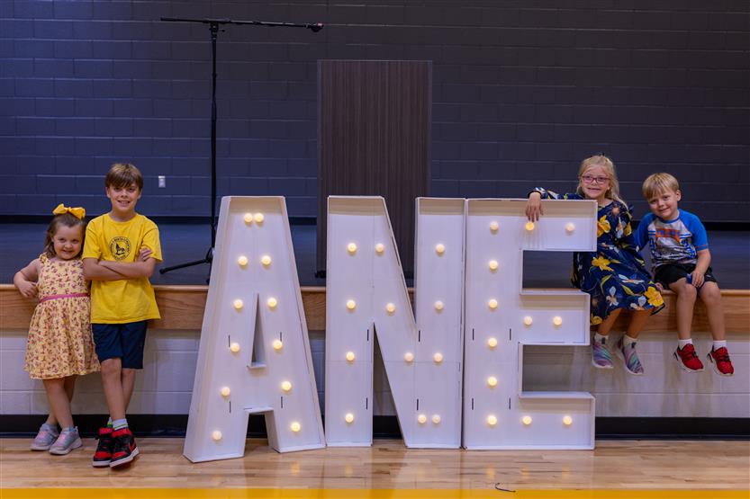 Students cut ribbon at new school